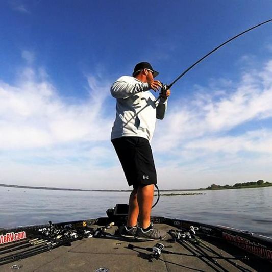 a person fishing on a boat